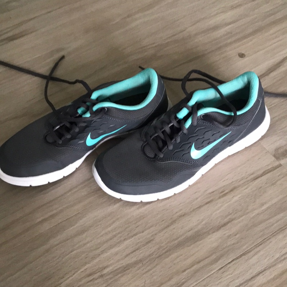 Gray and turquoise Nike sneakers